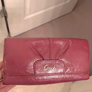 Coach Tri-Fold long wallet in raspberry color